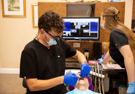 Tropical Dental Care patient getting teeth cleaned